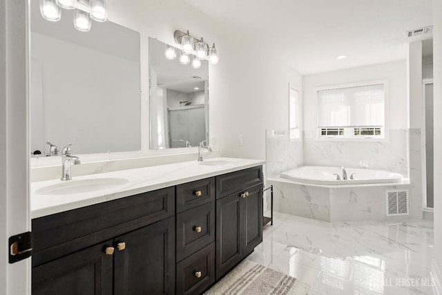 bathroom with vanity and plus walk in shower