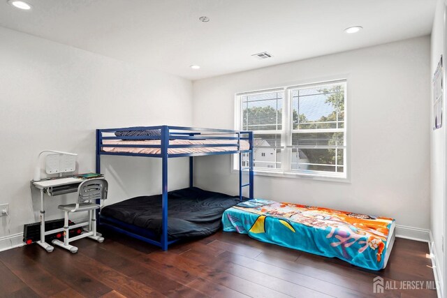 bedroom featuring hardwood / wood-style floors