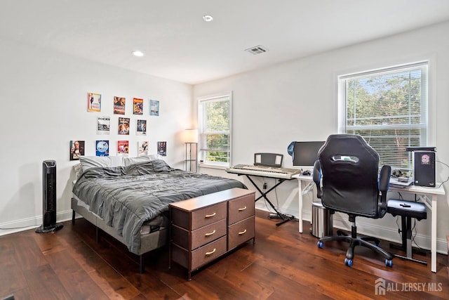 bedroom featuring dark wood-type flooring