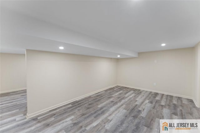 114 Holly St, Port Reading, NJ 07064 - finished below grade area featuring wood finished floors and recessed lighting