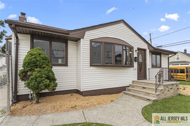 114 Holly St, Port Reading, NJ 07064 - single story home featuring a chimney
