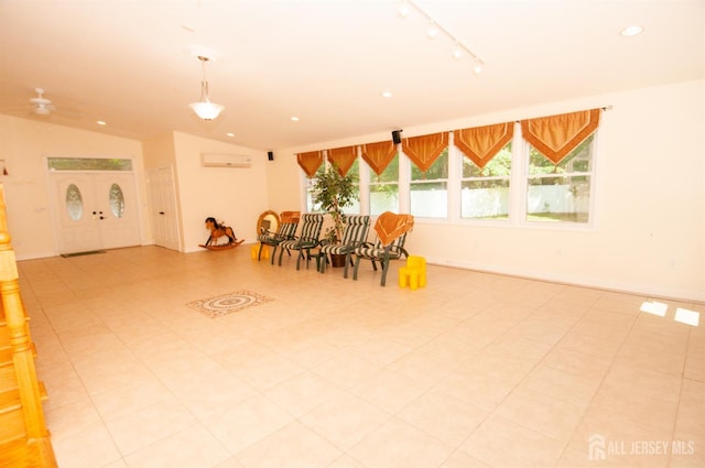 5 Dan Ct, Old Bridge, NJ 08857 - dining space with vaulted ceiling, rail lighting, recessed lighting, and an AC wall unit