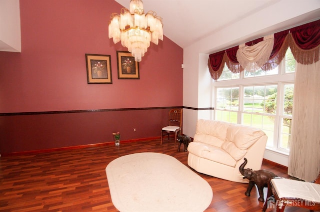 5 Dan Ct, Old Bridge, NJ 08857 - sitting room with vaulted ceiling, wood finished floors, and a chandelier