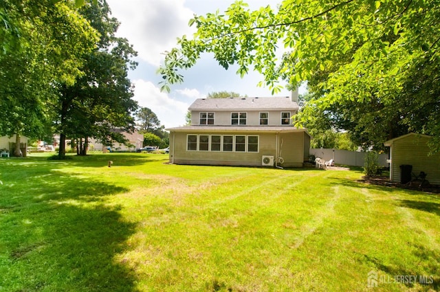 5 Dan Ct, Old Bridge, NJ 08857 - rear view of property with a chimney
