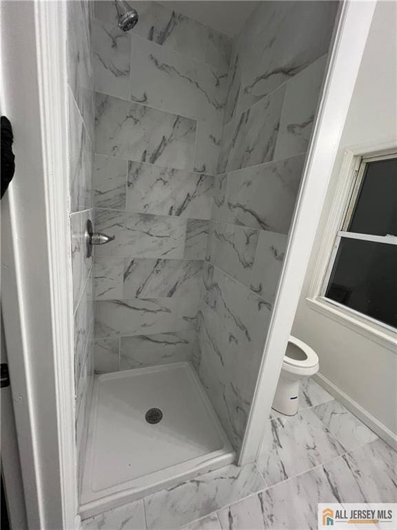 427 John St, Plainfield, NJ 07060 - bathroom with toilet, marble finish floors, and a shower stall