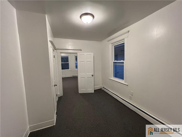 427 John St, Plainfield, NJ 07060 - hall featuring a baseboard radiator and baseboards