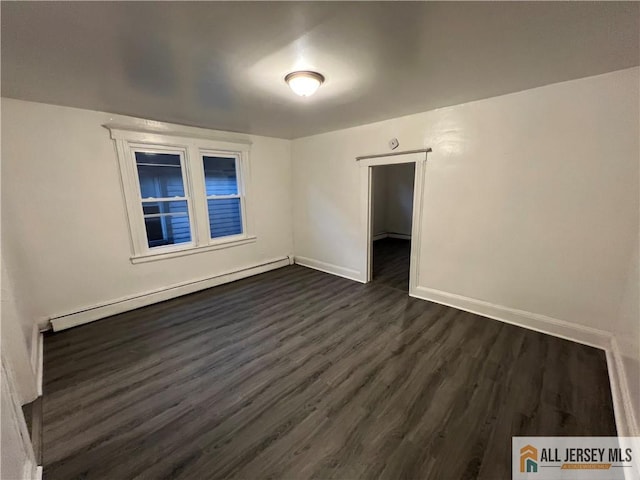 427 John St, Plainfield, NJ 07060 - unfurnished room featuring a baseboard radiator, dark wood-style floors, and baseboards