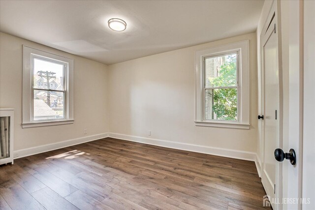 160 Academy St, South Orange Village, NJ 07079 - spare room with healthy amount of natural light and dark wood-style floors