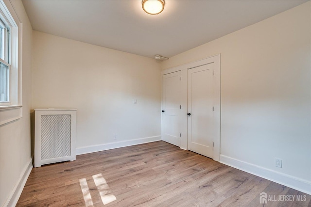 160 Academy St, South Orange Village, NJ 07079 - empty room featuring radiator and wood finished floors