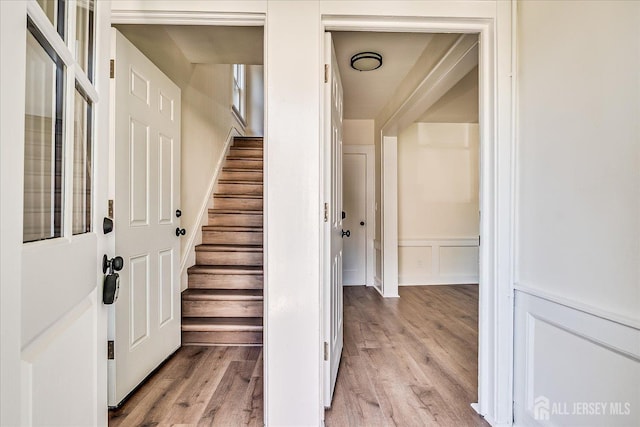 160 Academy St, South Orange Village, NJ 07079 - stairway with wood finished floors, a decorative wall, and a wainscoted wall