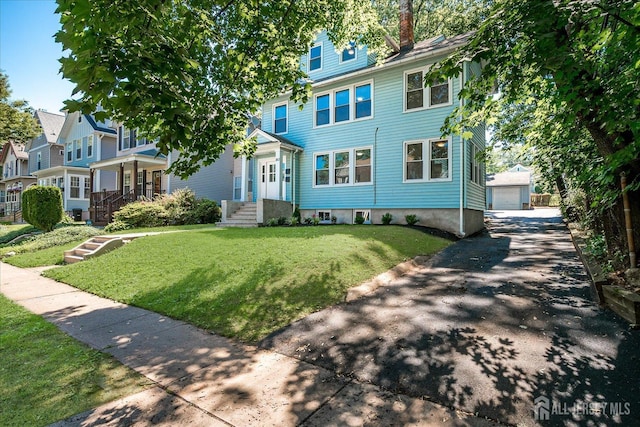 160 Academy St, South Orange Village, NJ 07079 - traditional style home with a front yard, a garage, and an outdoor structure