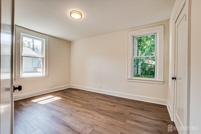 160 Academy St, South Orange Village, NJ 07079 - empty room with dark wood finished floors and healthy amount of natural light