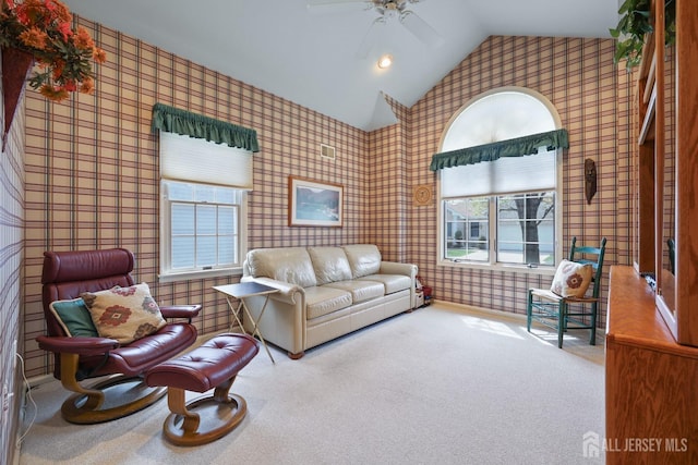 27 Dawson Ln, Monroe, NJ 08831 - living area with wallpapered walls, vaulted ceiling, a ceiling fan, carpet floors, and healthy amount of natural light