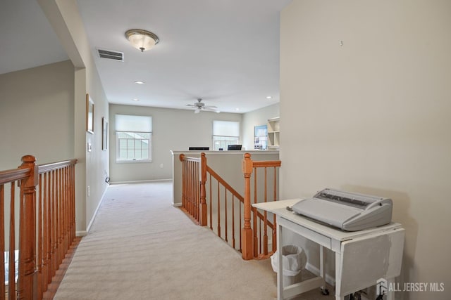 27 Dawson Ln, Monroe, NJ 08831 - hallway with an upstairs landing, light colored carpet, recessed lighting, and baseboards