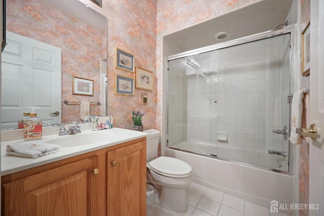 27 Dawson Ln, Monroe, NJ 08831 - full bathroom with tile patterned floors, toilet, wallpapered walls, vanity, and enclosed tub / shower combo