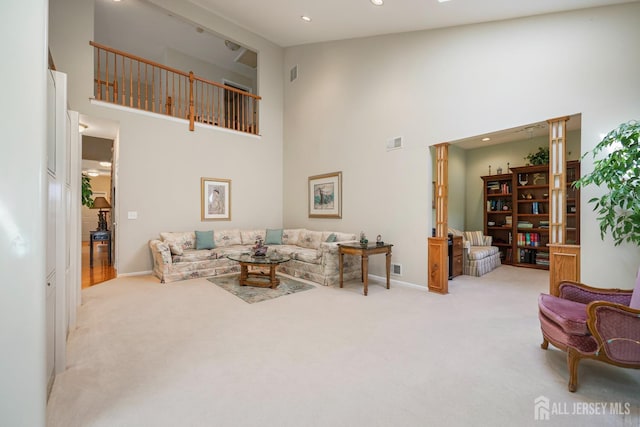 27 Dawson Ln, Monroe, NJ 08831 - carpeted living area with high vaulted ceiling, baseboards, and recessed lighting