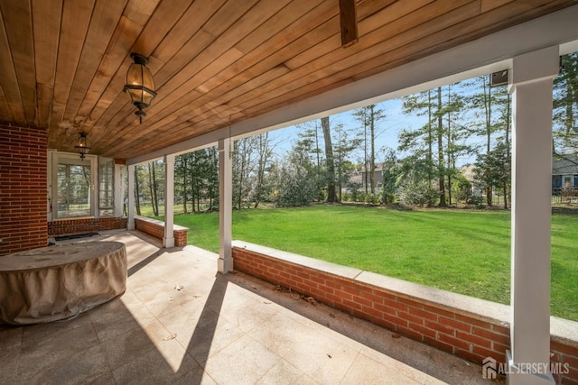 unfurnished sunroom with a healthy amount of sunlight