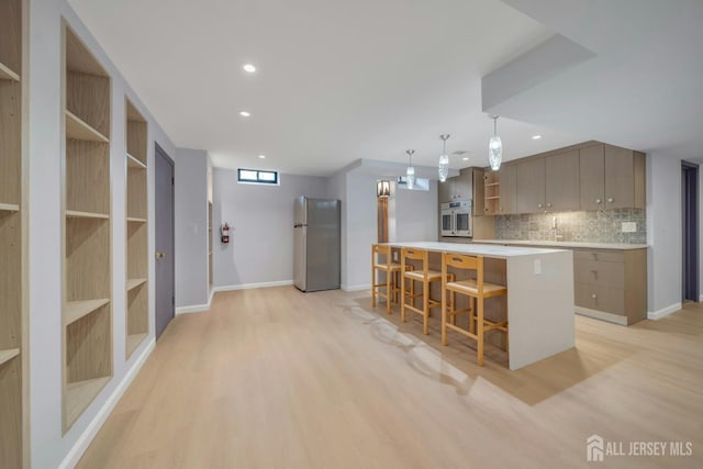 kitchen with a large island, recessed lighting, light wood-style flooring, open shelves, and appliances with stainless steel finishes