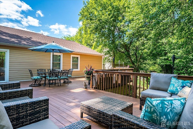 16 Rachele Ct, Old Bridge, NJ 07747 - wooden terrace featuring outdoor dining area and an outdoor hangout area