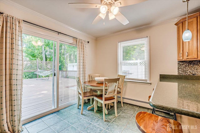 16 Rachele Ct, Old Bridge, NJ 07747 - dining space with a baseboard heating unit, ornamental molding, light tile patterned floors, and a ceiling fan