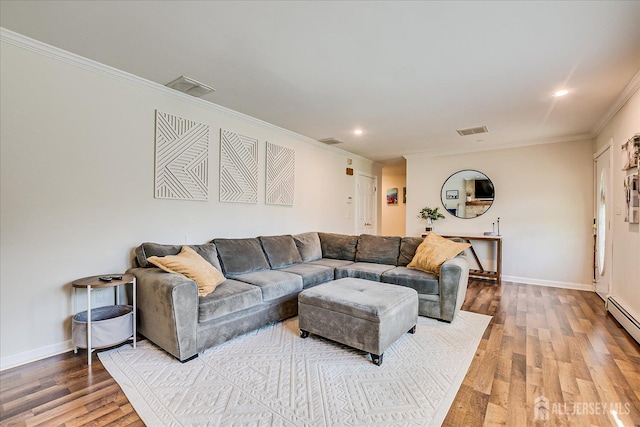 16 Rachele Ct, Old Bridge, NJ 07747 - living room with wood finished floors, ornamental molding, baseboards, and recessed lighting