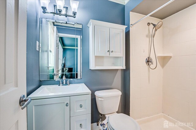 16 Rachele Ct, Old Bridge, NJ 07747 - full bathroom with toilet, a tile shower, and vanity