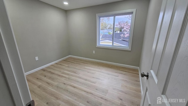 1150 Rahway Ave, Avenel, NJ 07001 - empty room with light wood-style floors, baseboards, and recessed lighting