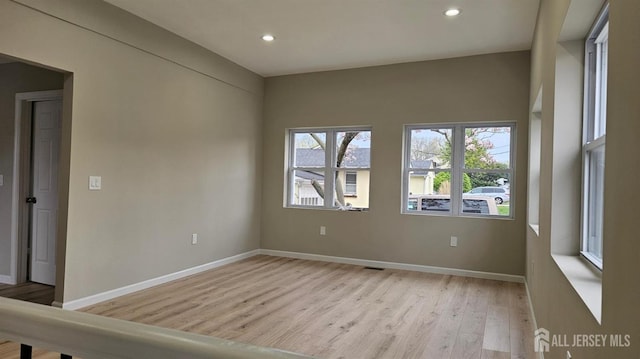 1150 Rahway Ave, Avenel, NJ 07001 - unfurnished room featuring light wood-style flooring, baseboards, and recessed lighting