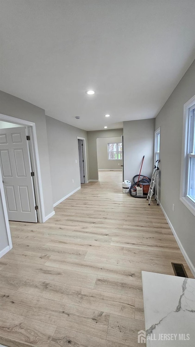 1150 Rahway Ave, Avenel, NJ 07001 - living area with light wood-type flooring, recessed lighting, and baseboards