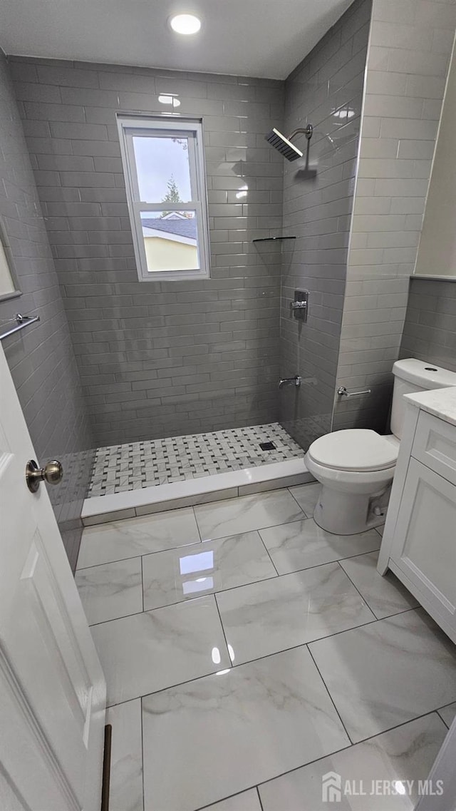 1150 Rahway Ave, Avenel, NJ 07001 - full bathroom featuring marble look tile flooring, vanity, toilet, tiled shower, and recessed lighting