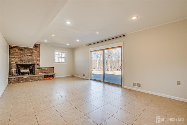 unfurnished living room featuring light tile patterned floors, a fireplace, visible vents, baseboards, and recessed lighting