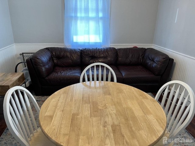 dining area with hardwood / wood-style flooring