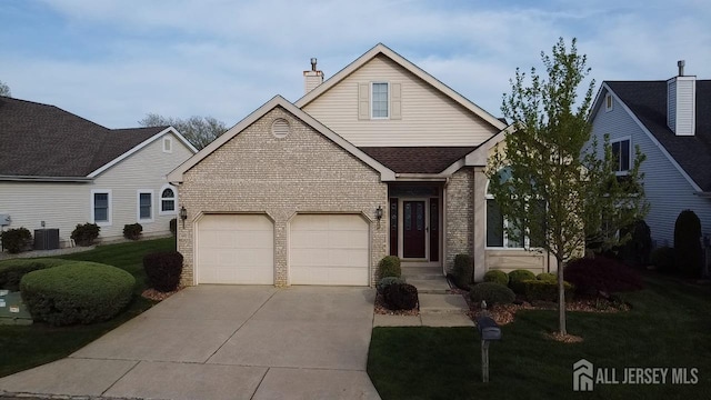 136 Chichester Rd, Monroe, NJ 08831 - traditional-style house featuring brick siding, driveway, cooling unit, a chimney, and a garage
