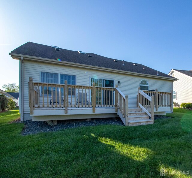 136 Chichester Rd, Monroe, NJ 08831 - rear view of house with a yard and a deck