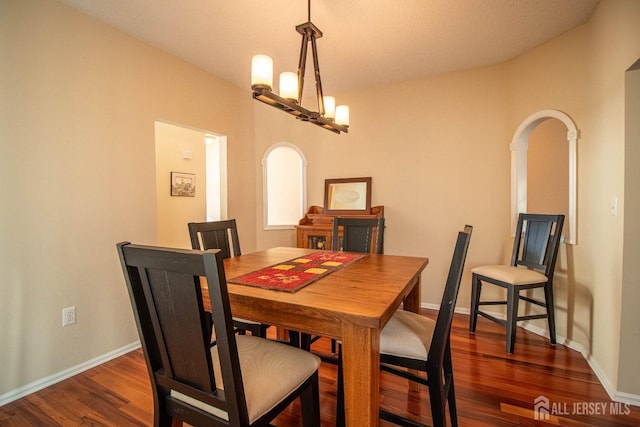 136 Chichester Rd, Monroe, NJ 08831 - dining space with arched walkways, wood finished floors, and baseboards