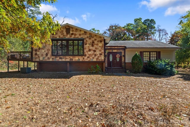 view of front of home with a wooden deck