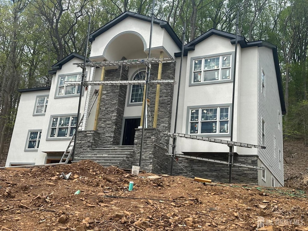 79 Park Pl, Watchung, NJ 07069 - view of front facade with stone siding and stucco siding