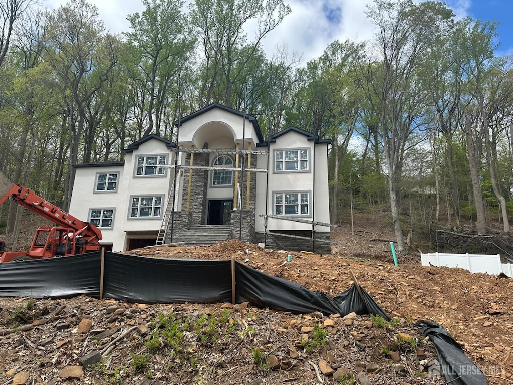 79 Park Pl, Watchung, NJ 07069 - back of house featuring fence and stucco siding