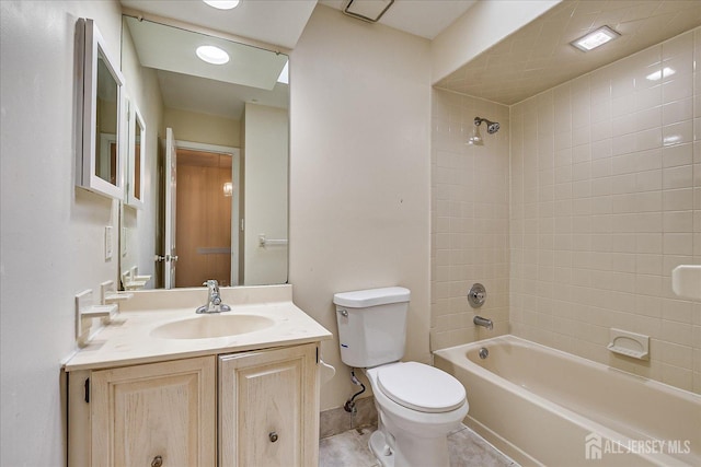 full bathroom featuring bathtub / shower combination, vanity, toilet, and tile patterned floors