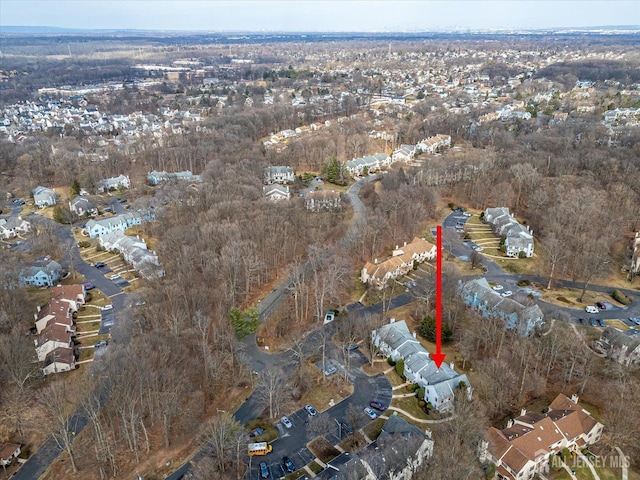 birds eye view of property with a residential view