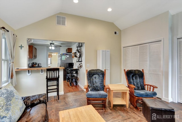 274 Prospect Ave, South Amboy, NJ 08879 - living area with high vaulted ceiling, healthy amount of natural light, baseboards, and a ceiling fan