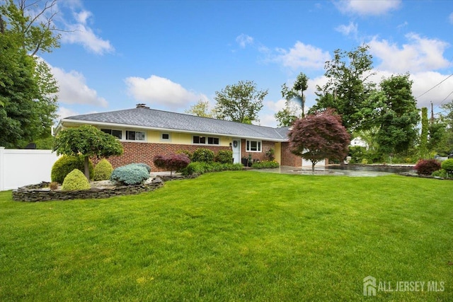 44 Lakeside Dr S, Piscataway, NJ 08854 - back of house featuring brick siding and a chimney