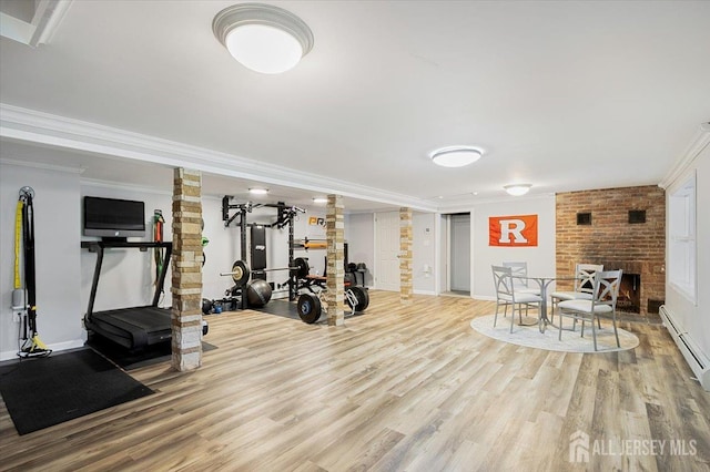 44 Lakeside Dr S, Piscataway, NJ 08854 - exercise room with ornate columns, light wood-type flooring, a baseboard radiator, baseboards, and crown molding
