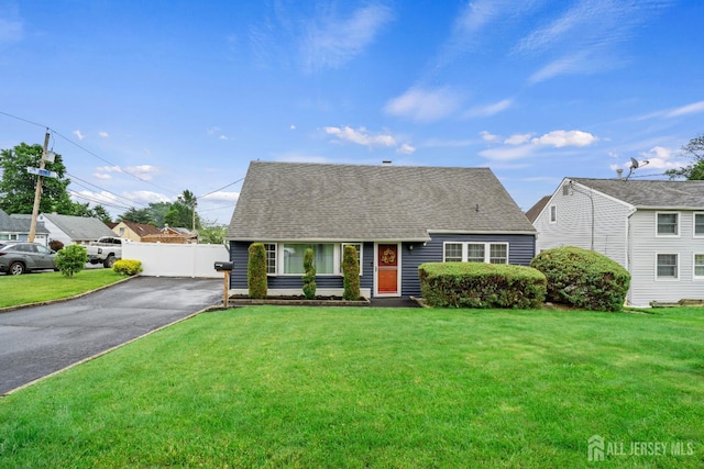 6 Linda Ave, Colonia, NJ 07067 - new england style home with asphalt driveway and a shingled roof