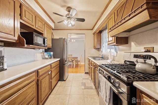 6 Linda Ave, Colonia, NJ 07067 - kitchen with stainless steel appliances, ornamental molding, custom range hood, a ceiling fan, and light countertops