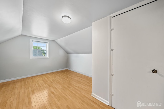 6 Linda Ave, Colonia, NJ 07067 - additional living space featuring hardwood / wood-style floors and vaulted ceiling