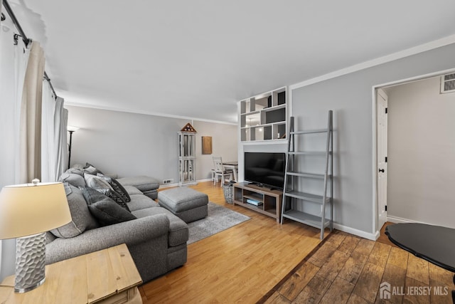 6 Linda Ave, Colonia, NJ 07067 - living area with hardwood / wood-style flooring and baseboards