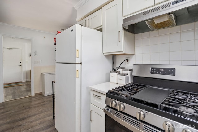 kitchen featuring under cabinet range hood, white cabinetry, dark wood-style flooring, and gas stove