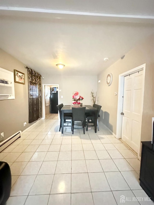44 S Ward St, New Brunswick, NJ 08901 - dining space with a baseboard heating unit and light tile patterned floors