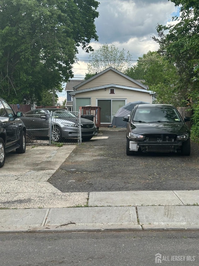 view of front of home with uncovered parking